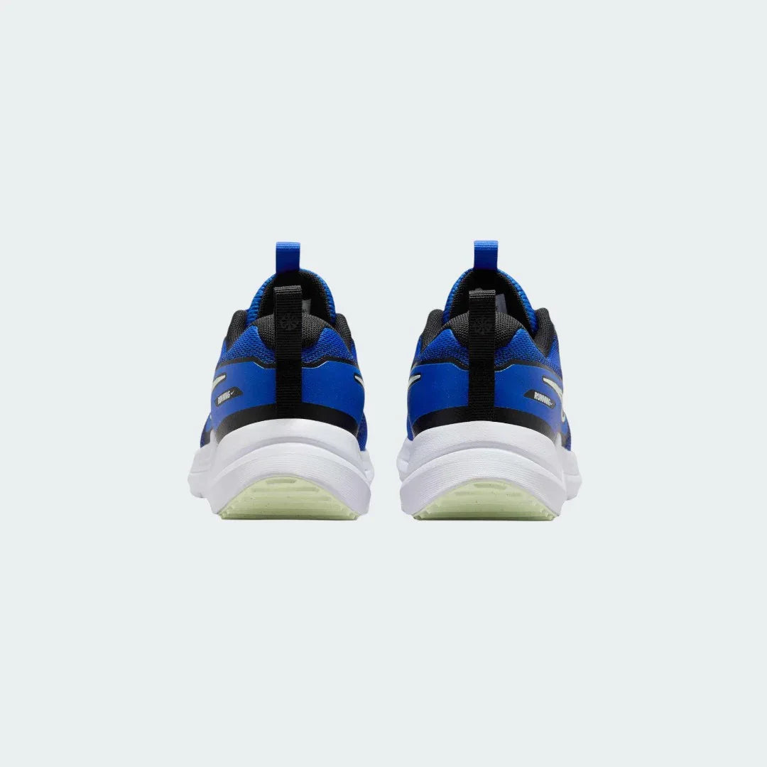 Rear view of the Nike Cosmic Runner Juniors' blue running trainers, focusing on the structured heel and subtle branding.
