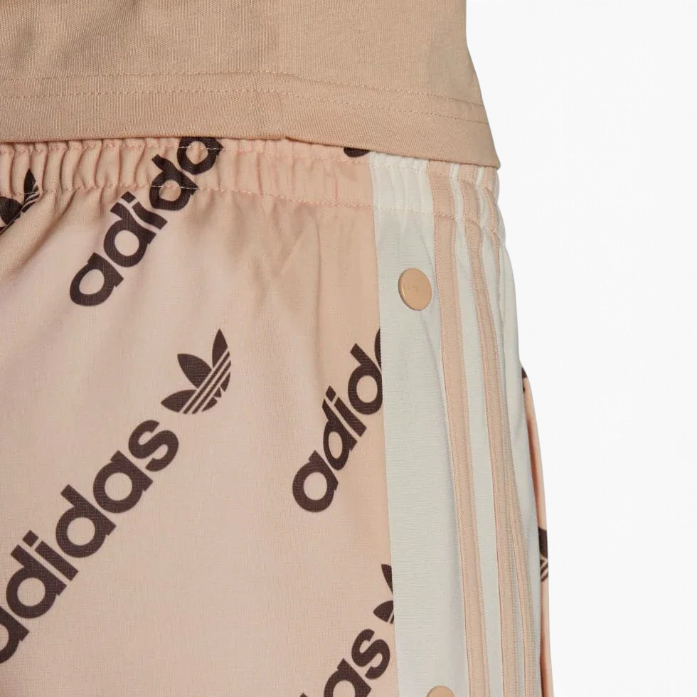 Trade Sports adidas Adibreak track pants in halo blush with allover logo print and side snap button detail