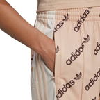 Trade Sports Adidas Adibreak track pants in halo blush with monogram logo print and side snap button detail