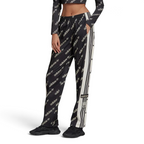 A pair of black Adidas Adibreak track pants with white stripes and monogrammed Adidas logos, featuring a drawcord on elastic waist.