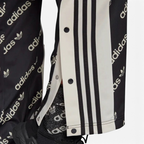 Close up showing the poppers open at the foot of the pants