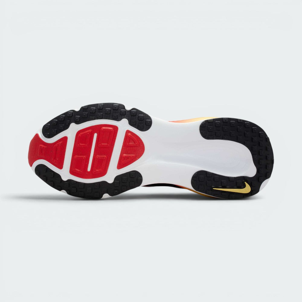 Displays the redesigned traction pattern across the rubber sole, highlighting the strategically positioned agility pods engineered for unreal everyday multi-surface road grip and a smooth, fluid roll-through.