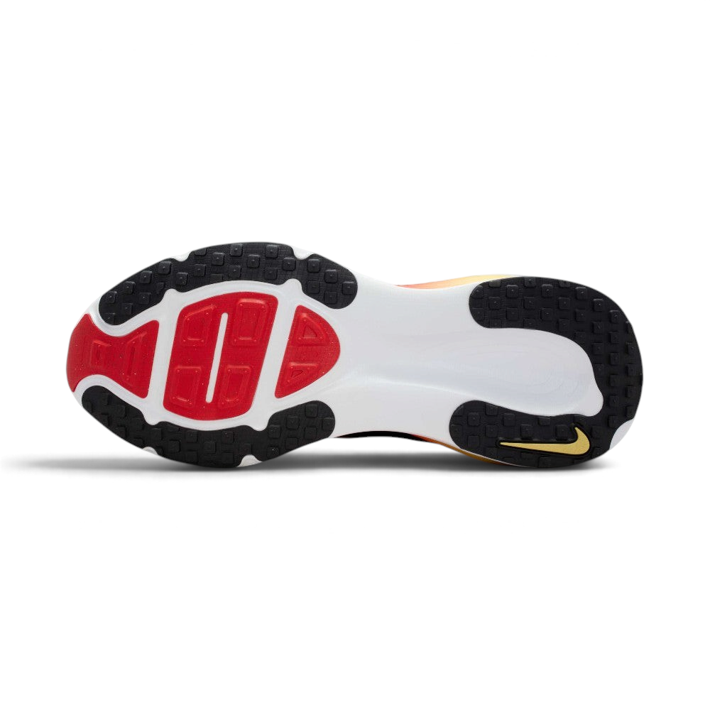 Displays the redesigned traction pattern across the rubber sole, highlighting the strategically positioned agility pods engineered for unreal everyday multi-surface road grip and a smooth, fluid roll-through.