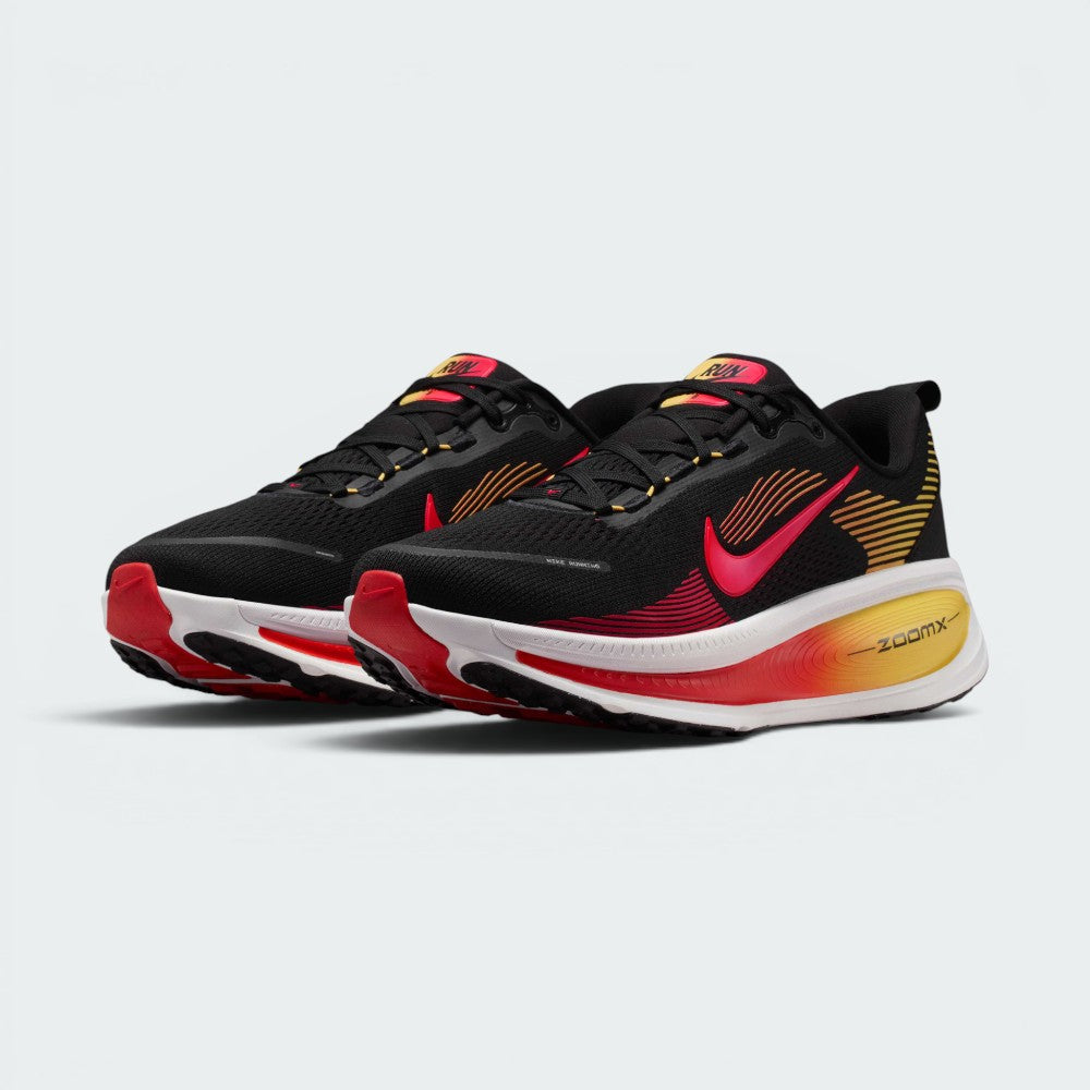 Emphasising the maximalist, forward-leaning athletic stance of the trainers and the professional harmony of the deep black uppers sitting cleanly above the stacked dual-foam sole tooling.