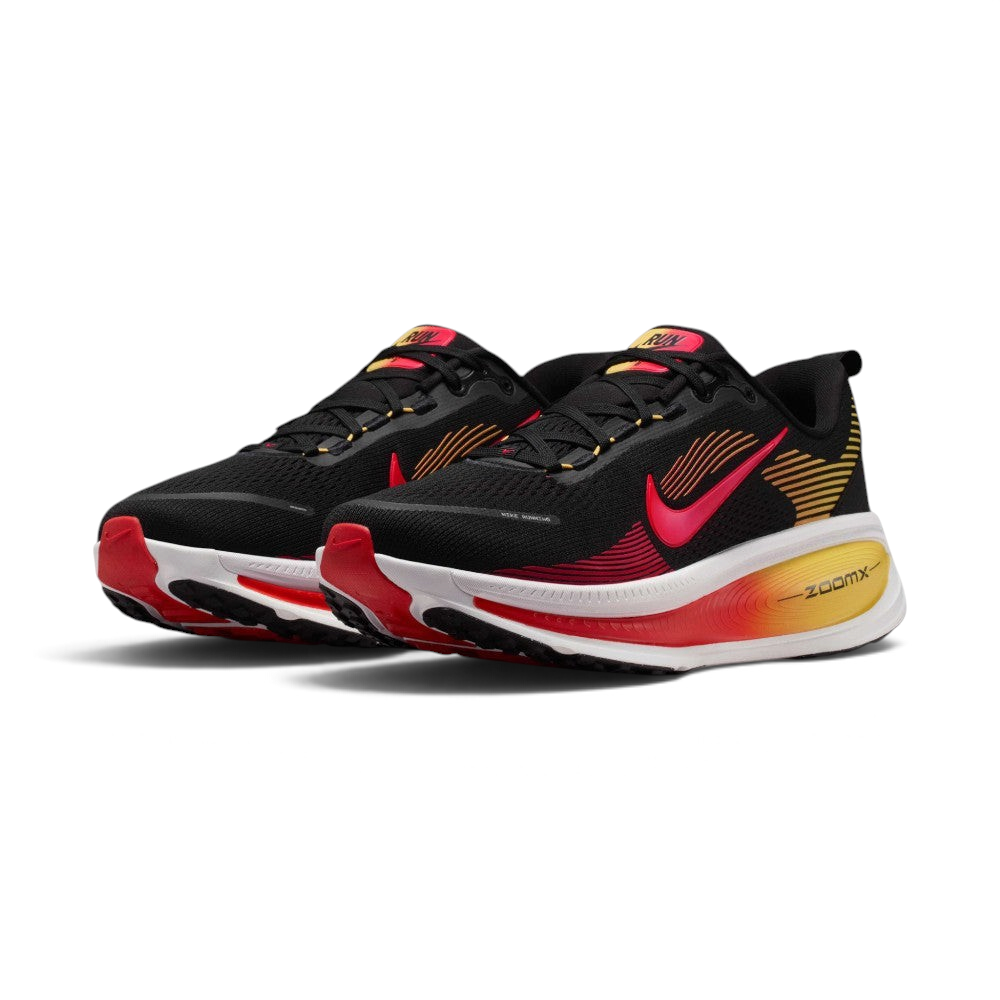 Emphasising the maximalist, forward-leaning athletic stance of the trainers and the professional harmony of the deep black uppers sitting cleanly above the stacked dual-foam sole tooling.