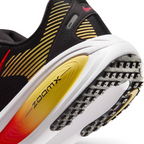 Highlights the "unreal" clean finish where the responsive ReactX foam carrier meets the ZoomX top layer, framing the technical compression lines of the cushioning package.