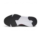 Trade Sports Nike Run Defy running shoe showing the durable black and white multi-surface rubber outsole tread.