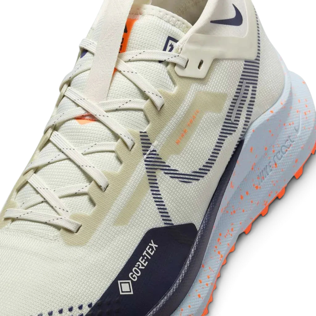 Close-up of Nike React Pegasus Trail 4 GTX V2 Trail Shoes HM9728-001 GORE-TEX label and upper mesh texture