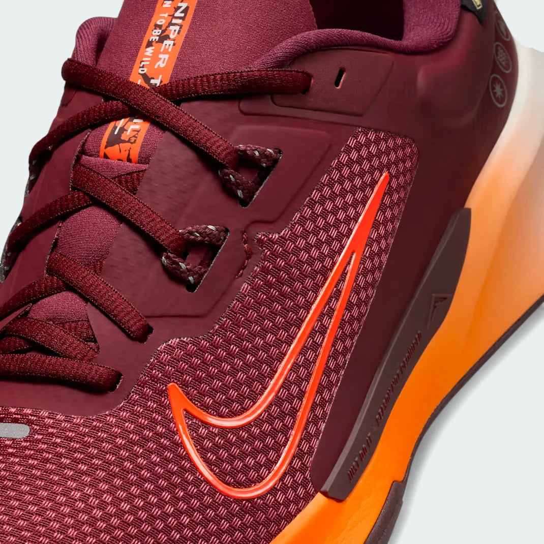 Close-up zoom on the front of the Nike Juniper Trail 2 GORE-TEX V2 trail shoes, showing the reinforced toe cap, waterproof upper texture, and lacing system.