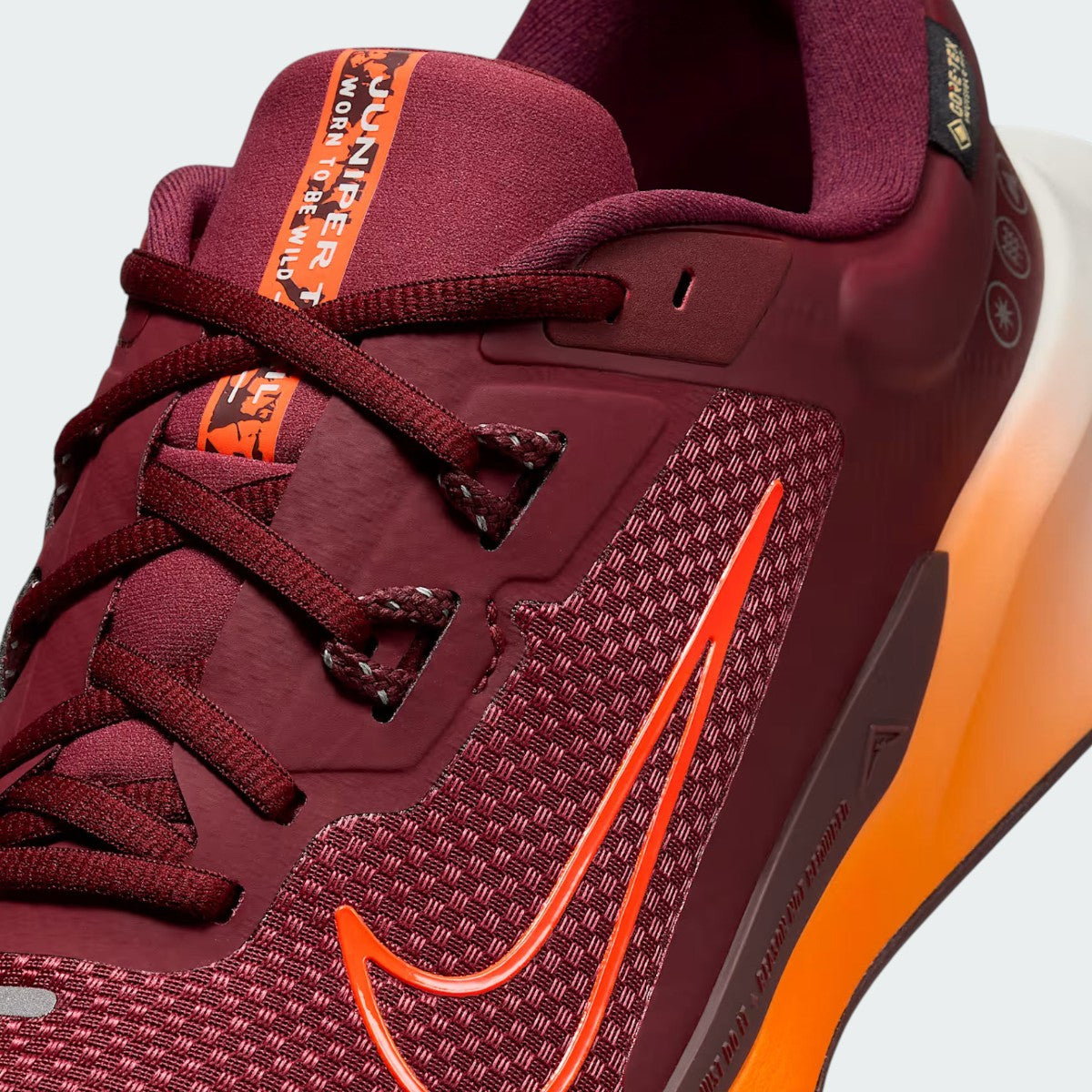 Close-up zoom on the front of the Nike Juniper Trail 2 GORE-TEX V2 men's trail shoes, showing the reinforced toe cap, mesh upper texture, and lacing system.