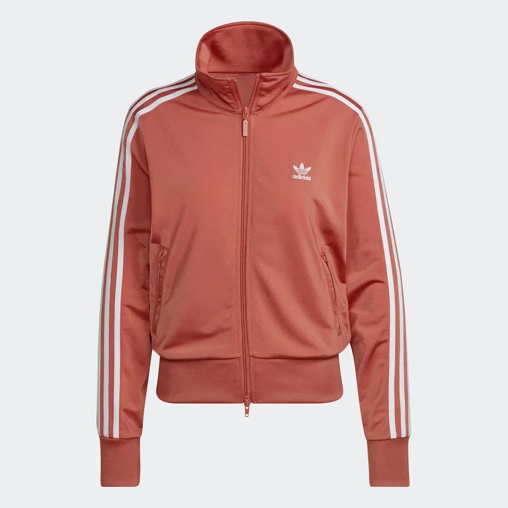 Top-down view of the Magic Earth track jacket laid flat, highlighting the full-zip front and the iconic stand-up collar.