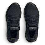 Top-down view of a pair of Adidas by Stella McCartney Ultra Boost 20 Women's trainers in black, highlighting their seamless Primeknit construction and unique lacing.