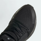 Close-up zoom on the front of the Adidas by Stella McCartney Ultra Boost 20 trainers, showing the Primeknit texture and unique lacing system.