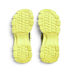 View of the outsole of the Adidas by Stella McCartney Hika Sandals in yellow, showing the durable tread pattern for grip.
