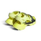 Angled view of two from the rear Adidas by Stella McCartney Hika Sandals in yellow and black, side by side, showcasing their robust yet stylish design.