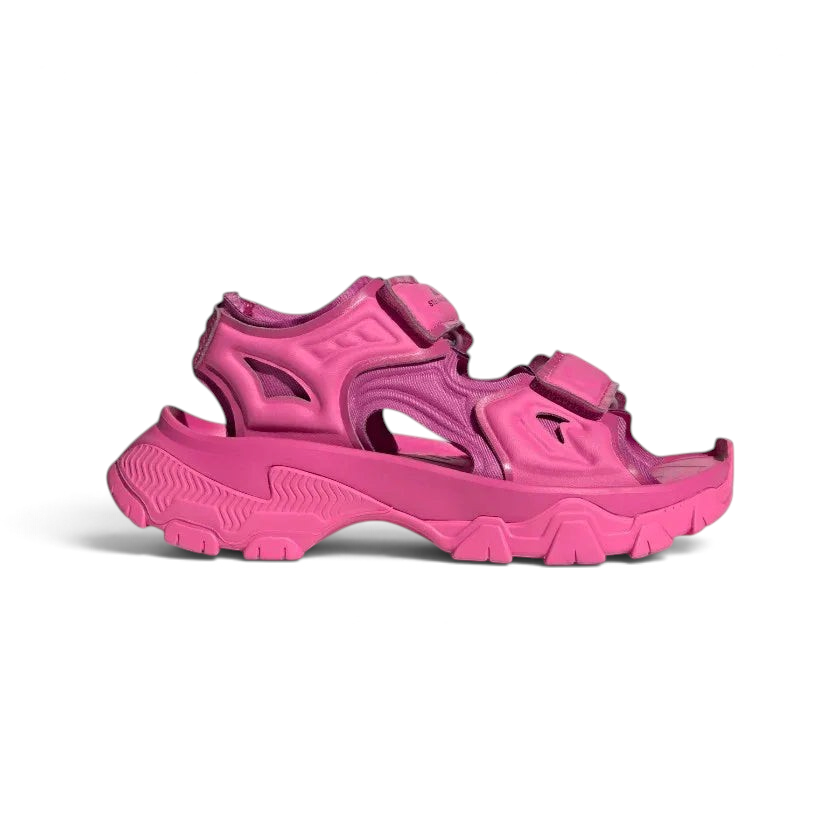 Adidas by Stella McCartney Hika Sandal in pink, side profile showing adjustable hook-and-loop straps, chunky sole, and collaborative branding.