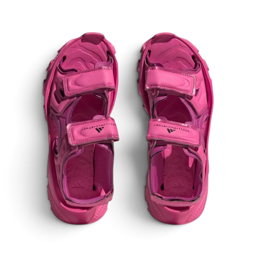 Top-down view of a pair of Adidas by Stella McCartney Hika Sandals in pink, highlighting the multiple straps and footbed design.