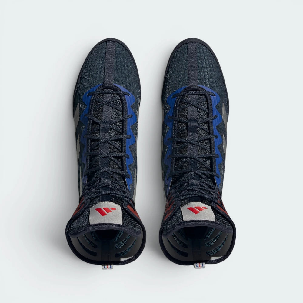 Focuses on the tightly locked-in lace closure layout, showing the clean alignment of the thin mesh tongue and the gray reinforcements framing the toe box.