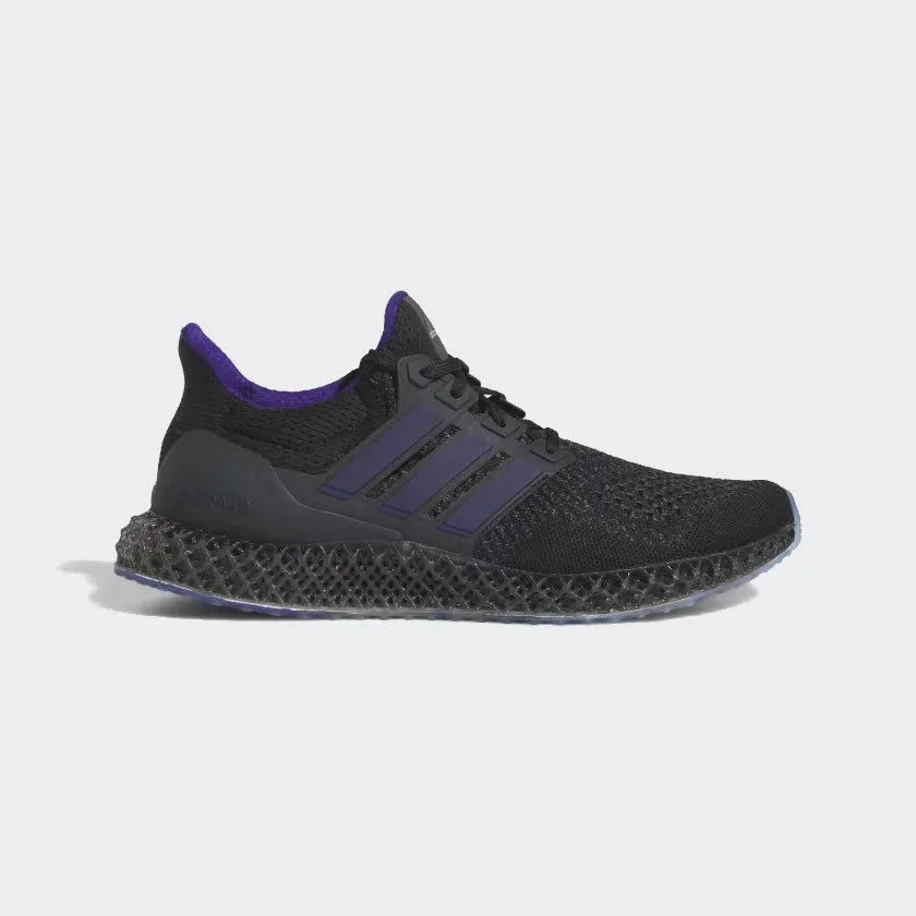 Adidas Ultra 4D x Rich Mnisi Pride men's trainers in a multi-color design, side profile showing the Primeknit upper with vibrant patterns, futuristic 3D-printed 4D midsole, and a black cage.