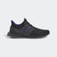 Adidas Ultra 4D x Rich Mnisi Pride men's trainers in a multi-color design, side profile showing the Primeknit upper with vibrant patterns, futuristic 3D-printed 4D midsole, and a black cage.