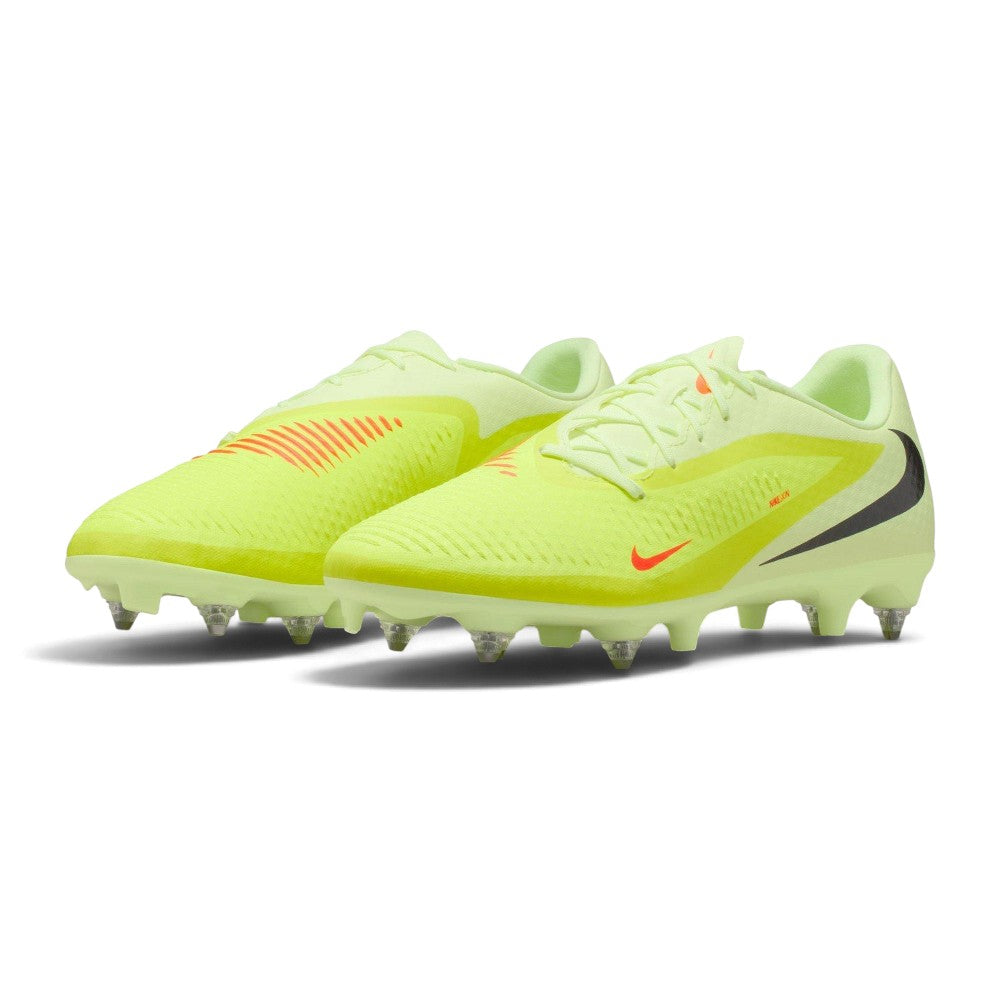 Three-quarter forward angle of the football boots displaying their vibrant lime green aesthetic, low-cut collar, and textured upper overlays.