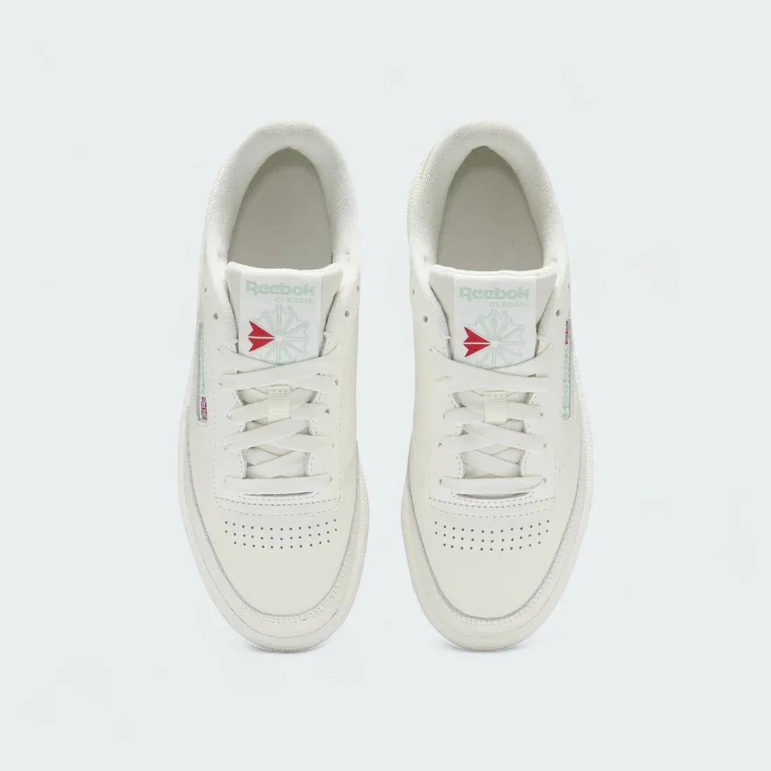 Reebok Club C 85 Women's Chalk Leather Trainers HQ0947 top view showing lace-up front, perforated toe box, and retro-style tongue tag