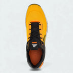 Top-down view of a pair of Adidas Five Ten Trailcross LT shoes in gold, highlighting their streamlined silhouette and lacing system.