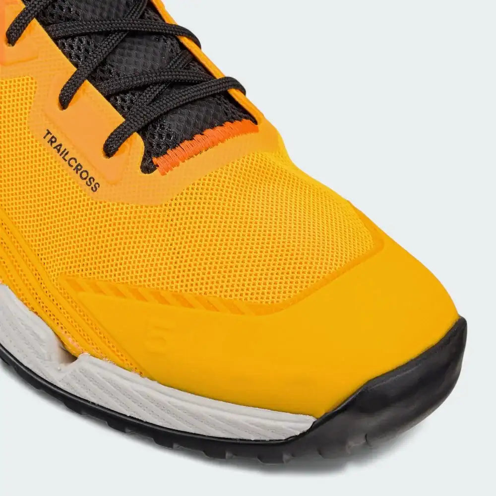 Close-up zoom on the front of the Adidas Five Ten Trailcross LT shoes, showing the protective toe bumper, breathable mesh, and lacing system.