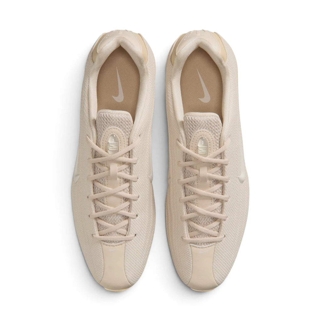 Top-Down View of Pair: Overhead view looking down at the laced oatmeal trainers, displaying the tonal flat laces, technical mesh tongue, and branded insoles.   