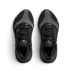 Top-down view of the running shoes, highlighting the engineered mesh inserts and the integrated Stella McCartney branding on
