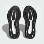 View of the rubber outsole, showcasing the stretchweb pattern designed to flex with the foot and provide grip on urban roads.