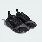 Three-quarter view of the pair, showcasing the contrast between the core black knit and the crisp cloud white midsole.