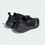 Rear view focusing on the supportive heel counter and the refined shape of the padded collar.