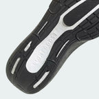 Detailed zoom on the Light BOOST foam, showcasing the pebbled texture of the cushioning and the precision bonding to the upper.