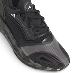 Close-up of the forefoot area, highlighting the breathable mesh texture and the premium lacing system.