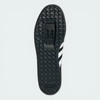Outsole view of the rubber sole, detailing the recessed mounting area for two-bolt SPD cleats.