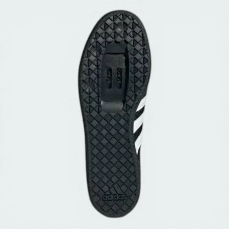 Outsole view of the rubber sole, detailing the recessed mounting area for two-bolt SPD cleats.