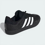 View from behind looking at the heel, showcasing the suede heel tab and the plush interior lining.