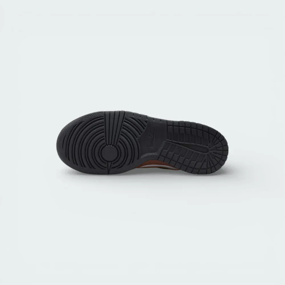 View of the black rubber outsole, showcasing the iconic hoops pivot circle and traction pattern designed for maximum grip.