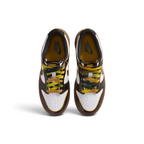 Top-down view of the White/Bright Citron/Black Dunk Lows, highlighting the perforated toe box and the yellow Nike branding on the tongue.