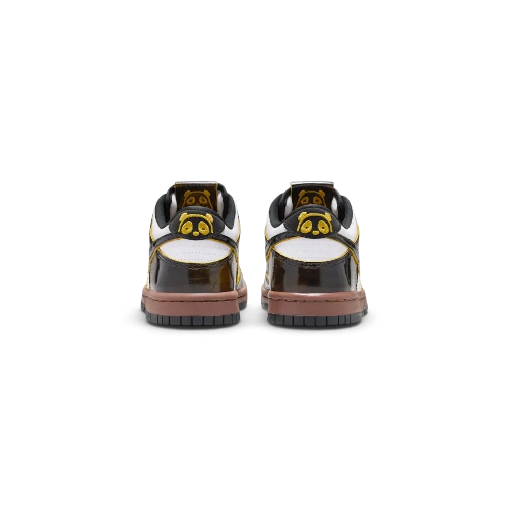 Rear view focusing on the Bright Citron heel tab with embroidered Nike branding and the clean white midsole.