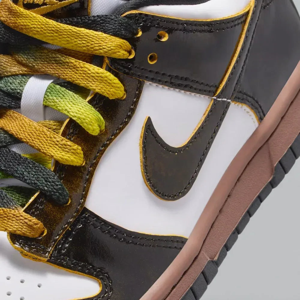 Close-up of the front, showing the quality of the white leather toe box and the secure black lacing system.