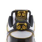 Close-up of a sneaker with panda face design on a white background