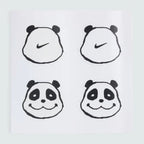 Four black panda illustrations with a smile on a white background