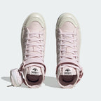 Focuses on the locked-in traditional lacing layout, displaying the perfect symmetry of the pink textile tongue, the silver-tone eyelets, and the clean Off White rubber toe cap shielding the front box.