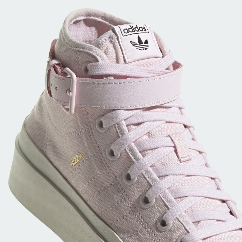 Details the premium canvas stitching tracking around the eyelet panels and the crisp, clean definition of the ridged rubber toe cap protection matrix.