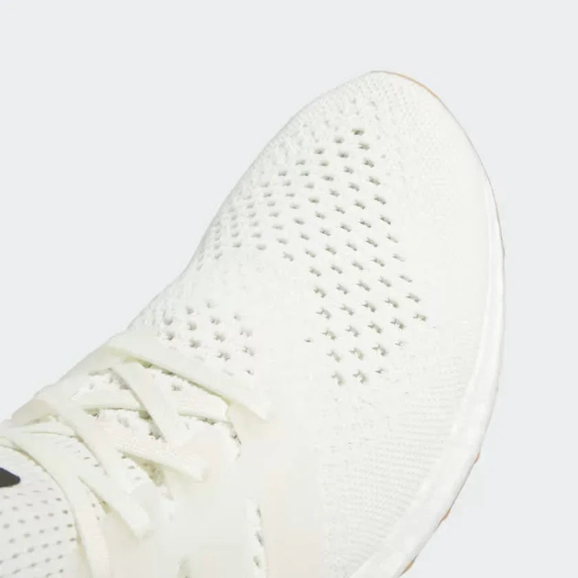 Close-up zoom on the front of the Adidas Ultraboost 1.0 Men's trainers, showing the Primeknit texture and unique lacing system.