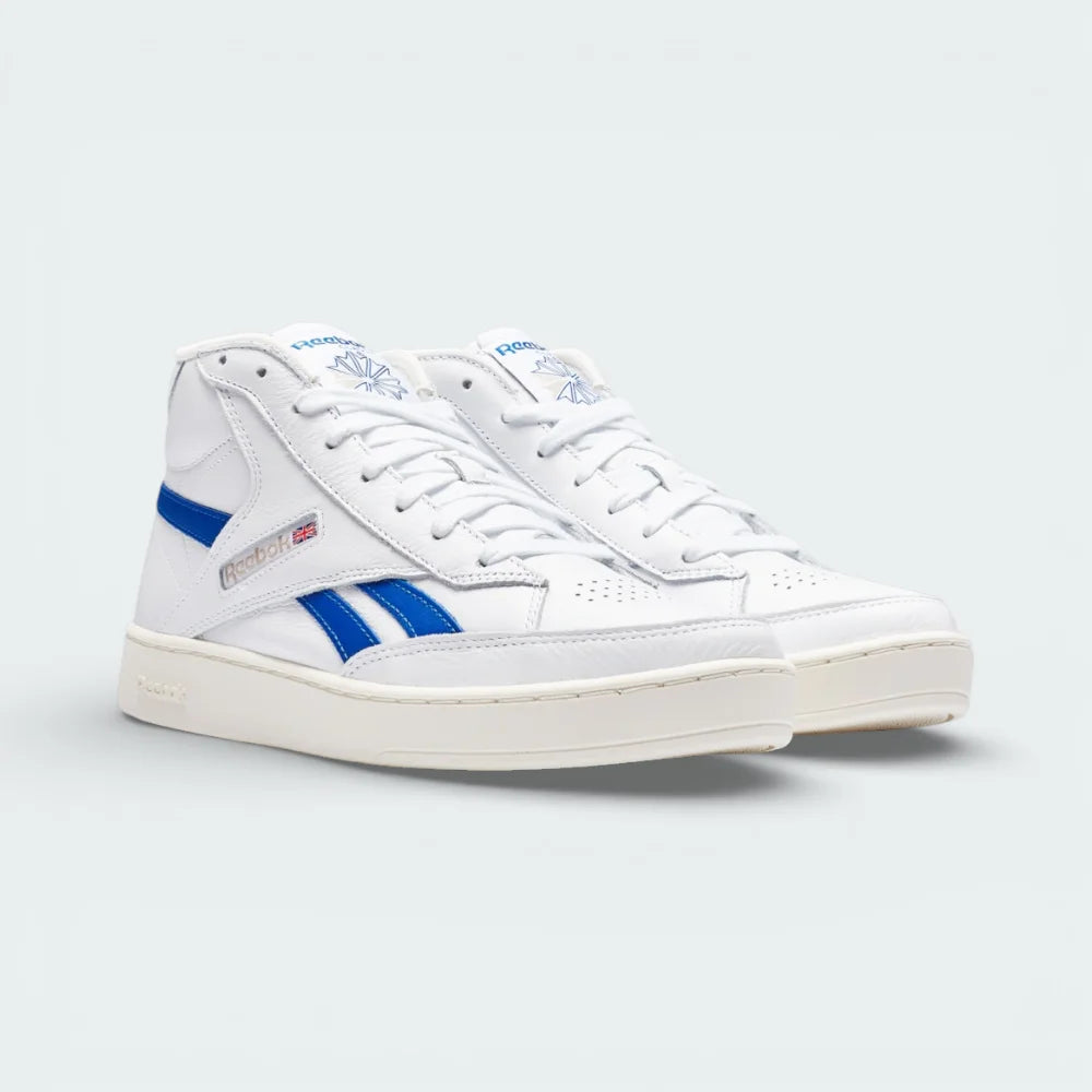 Angled shot of both Reebok Club C 85 Form Hi trainers side by side, showcasing the minimalist leather panels and deconstructed collar.