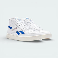 Angled shot of both Reebok Club C 85 Form Hi trainers side by side, showcasing the minimalist leather panels and deconstructed collar.