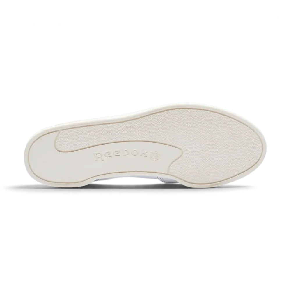 View of the durable rubber outsole, showcasing the iconic 80s court traction pattern in a tonal chalk finish.